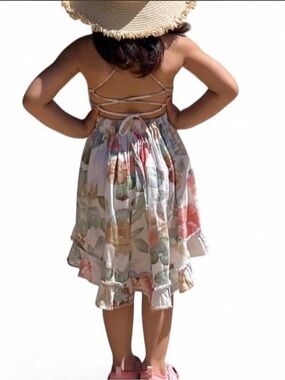 Boutique charming floral high-low dress 
NWT